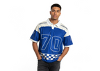 Man wearing a blue and white sports jersey with number 70 on a white background